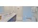 Modern bath with a white vanity, glass shower, and white tile at 3435 Bayshore Blvd # 2100P, Tampa, FL 33629