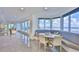 Charming dining area with a built-in bench and captivating water view, perfect for relaxing at 3435 Bayshore Blvd # 2100P, Tampa, FL 33629