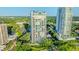 Beautiful exterior view of a luxury high-rise condo building with manicured landscaping at 3435 Bayshore Blvd # 2100P, Tampa, FL 33629