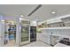 Well-appointed kitchen with stainless steel appliances, open shelving, and walk in pantry at 3435 Bayshore Blvd # 2100P, Tampa, FL 33629