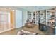 Office with built-in shelving, wood floors, and a comfortable leather chair at 3435 Bayshore Blvd # 2100P, Tampa, FL 33629