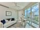 Office area featuring modern decor, desk, a large window with a view, and a comfy couch at 3435 Bayshore Blvd # 2100P, Tampa, FL 33629