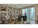 Stylish office with built-in bookshelves and a balcony offering city views at 3435 Bayshore Blvd # 2100P, Tampa, FL 33629