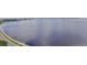 Beautiful waterfront view with a road and a glimpse of the cityscape in the distance at 3435 Bayshore Blvd # 2100P, Tampa, FL 33629