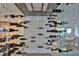 Elegant glass enclosed wine cellar with wire supports and a variety of wines at 3435 Bayshore Blvd # 2100P, Tampa, FL 33629