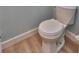 Close-up of a standard white toilet in a small, simple bathroom at 3751 Pompano Se Dr # 3751, St Petersburg, FL 33705