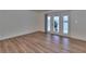 Well-lit living area with sliding glass doors leading to a patio, enhancing the indoor-outdoor feel at 3751 Pompano Se Dr # 3751, St Petersburg, FL 33705