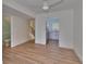 Light-filled living area showcasing open access to the kitchen and stairway at 3751 Pompano Se Dr # 3751, St Petersburg, FL 33705