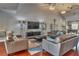 Inviting living room with leather sofas, large TV, and stylish decor for comfortable gatherings at 3751 Pompano Se Dr # 3751, St Petersburg, FL 33705