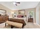 Bedroom featuring neutral paint, natural light, a ceiling fan, and carpet flooring at 3913 Little Egret Ct, Lutz, FL 33558