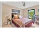 Comfortable bedroom with a plush bed, bedside tables, and a serene atmosphere at 3913 Little Egret Ct, Lutz, FL 33558