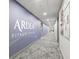 Hallway view of the fitness center featuring Ardea Fitness Center on the wall at 4769 Stoneview Cir, Oldsmar, FL 34677