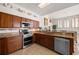 Kitchen with stainless appliances, tile backsplash, and granite counters at 4769 Stoneview Cir, Oldsmar, FL 34677