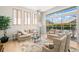 Bright living room with comfortable seating and pool view through sliding glass doors at 4769 Stoneview Cir, Oldsmar, FL 34677