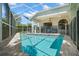 Inviting pool area featuring clear blue water and a screened enclosure for bug-free enjoyment at 4769 Stoneview Cir, Oldsmar, FL 34677