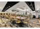 Open-concept restaurant featuring modern décor, ample seating, and stylish lighting fixtures at 4769 Stoneview Cir, Oldsmar, FL 34677