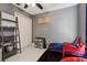 Playful bedroom with colorful décor, closet and tile floors at 4816 E 99Th Ave, Tampa, FL 33617