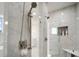 Detailed view of the shower showcasing elegant fixtures and a built-in niche at 5325 San Remo Cir, Wimauma, FL 33598