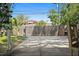 Wide backyard featuring a concrete patio area and tall wooden fence for privacy at 6213 10Th S Ave, Gulfport, FL 33707