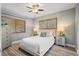 Serene bedroom showcasing a comfortable bed, natural light, and elegant decor at 6213 10Th S Ave, Gulfport, FL 33707