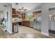 Open-concept kitchen with stainless steel appliances and ample cabinet space at 6213 10Th S Ave, Gulfport, FL 33707
