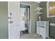 Convenient laundry area with stacked washer and dryer, and extra storage at 6213 10Th S Ave, Gulfport, FL 33707
