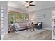 Comfortable living room featuring a large window, modern furniture, and contemporary decor at 6213 10Th S Ave, Gulfport, FL 33707