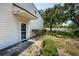 Inviting home entrance featuring manicured landscaping, a charming front door, and well-maintained walkway at 6238 92Nd N Pl # 3201, Pinellas Park, FL 33782