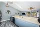 Bright kitchen with a large countertop, open to the living area and featuring modern appliances at 6238 92Nd N Pl # 3201, Pinellas Park, FL 33782
