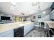 Open concept kitchen with ample counter space, modern appliances, and a view into the living area at 6238 92Nd N Pl # 3201, Pinellas Park, FL 33782