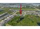 Expansive aerial view of a Primary-planned community with serene ponds and lush green spaces surrounding the neighborhood at 6307 Salt Creek Ave, Apollo Beach, FL 33572
