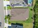 Aerial view showcasing the home's roof, yard, landscaping, and proximity to neighboring houses in the community at 6307 Salt Creek Ave, Apollo Beach, FL 33572