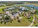 An aerial view of community amenities including a pool, tennis courts, playground and parking at 6307 Salt Creek Ave, Apollo Beach, FL 33572