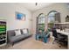 Cozy bedroom with a daybed, desk, and large windows that provides plenty of sunlight at 6307 Salt Creek Ave, Apollo Beach, FL 33572