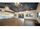 A community clubhouse featuring modern lighting, ample seating, and views of the outdoor pool at 6307 Salt Creek Ave, Apollo Beach, FL 33572