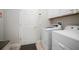 The laundry room features new appliances and a door to the outside at 6307 Salt Creek Ave, Apollo Beach, FL 33572