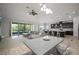 Open-concept living space seamlessly blending the kitchen, dining, and living areas at 6307 Salt Creek Ave, Apollo Beach, FL 33572