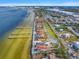 Waterfront homes with private docks line the coast, showcasing stunning views and convenient water access at 6408 Bright Bay Ct, Apollo Beach, FL 33572