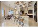 Open-concept kitchen area features breakfast bar and access to dining and living spaces at 6408 Bright Bay Ct, Apollo Beach, FL 33572