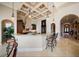 Spacious kitchen features breakfast bar, custom cabinetry, and seamless flow to other spaces at 6408 Bright Bay Ct, Apollo Beach, FL 33572