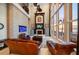 Beautiful living room featuring ocean view, fireplace, entertainment center, and comfortable seating at 6408 Bright Bay Ct, Apollo Beach, FL 33572
