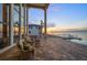 Outdoor patio with comfortable seating and panoramic views of the ocean at 6408 Bright Bay Ct, Apollo Beach, FL 33572
