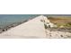 A concrete pier featuring benches and a view of the ocean at 6461 Rubia Cir, Apollo Beach, FL 33572