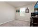 Empty bedroom with a window and a TV on a cabinet at 6534 Trent Creek Dr, Ruskin, FL 33573
