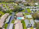 Enjoy community amenities with pool, shuffleboard, lush landscaping, and convenient parking at 6745 Basswood Cir, Zephyrhills, FL 33542