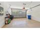 A clean and spacious garage with room for a car and storage at 7413 Surrey Wood Ln, Apollo Beach, FL 33572