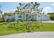 Charming single-story home with well-manicured lawn and a two-car garage at 7504 Carissa, Punta Gorda, FL 33955