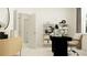 Home office featuring a black desk, shelving unit, and neutral color palette at 7533 E 116Th St, Palmetto, FL 34221