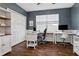 Office space featuring a neutral color scheme, built in desk, and a closet at 7725 Bingham Ct, Tampa, FL 33625