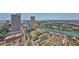Stunning aerial view of the city, highlighting buildings, waterways, and a vibrant outdoor event at 777 N Ashley Dr # 3002, Tampa, FL 33602